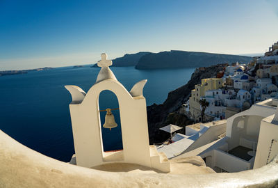 Panoramic view of sea and buildings against sky