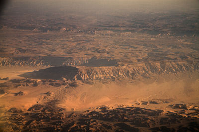 Aerial view of desert against sky