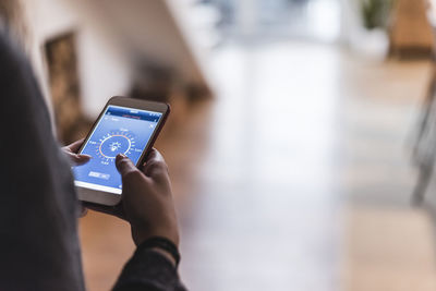 Close-up of person using mobile phone