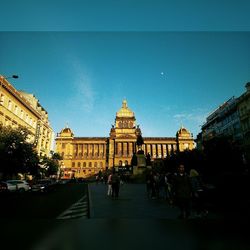 View of built structures against blue sky