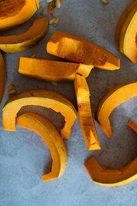 High angle view of yellow pumpkins on metal