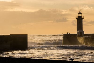 Scenic view of sea at sunset