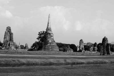 View of temple building against cloudy sky