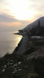 Scenic view of sea against sky during sunset