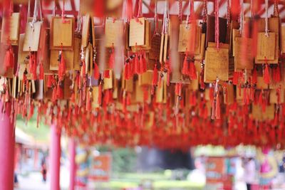 Full frame shot of multi colored lanterns hanging in temple