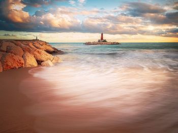 Scenic view of sea against sky during sunset