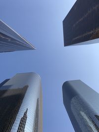 Low angle view of modern buildings against sky