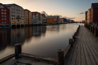 Canal amidst buildings in city