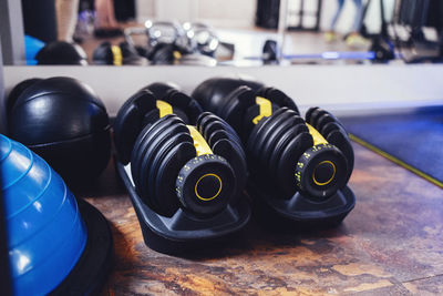 Close-up of dumbbells on table