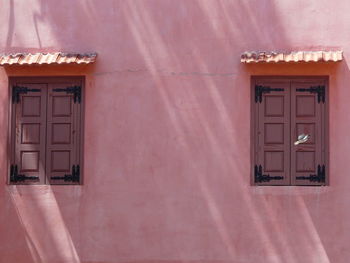 Low angle view of house against building