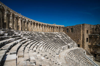 Aspendos amphitheater close-up inside in the summertime with sunshine, turkey, serik.