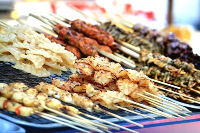 Close-up of meat on barbecue grill