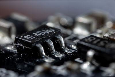 Close-up of machine part on table