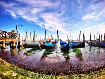 Boats moored in sea
