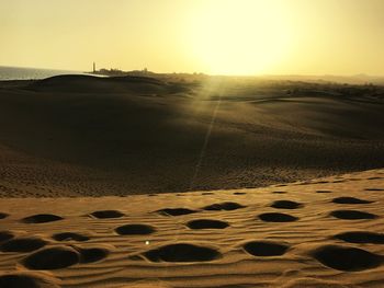 Scenic view of desert during sunset