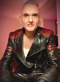 Portrait of man sitting outdoors