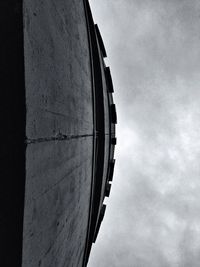 Low angle view of building against cloudy sky