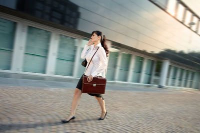 Full length of woman walking outdoors