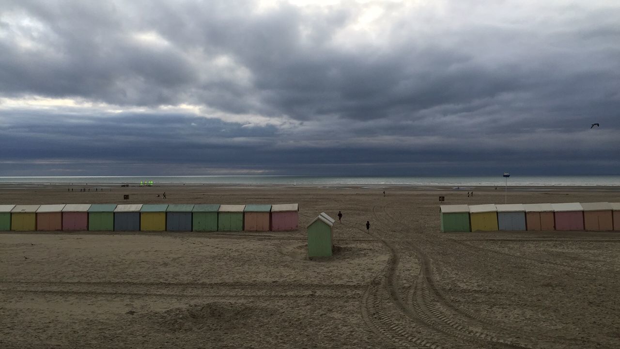 sky, sea, horizon over water, beach, cloud - sky, cloudy, sand, water, shore, cloud, tranquil scene, scenics, tranquility, nature, beauty in nature, overcast, weather, idyllic, outdoors, day