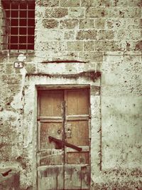 Brick wall with closed door