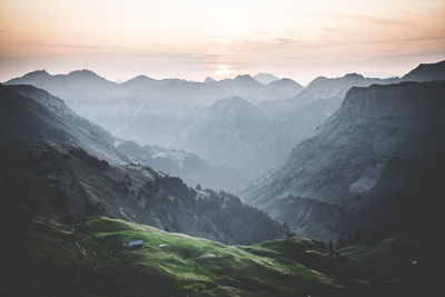 Scenic view of mountains against sky during sunset