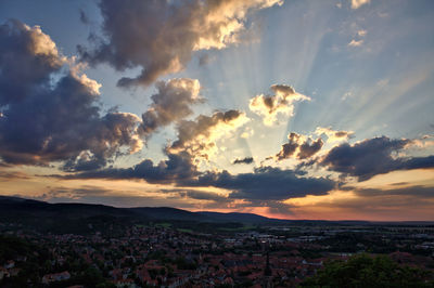 Scenic view of sunset over city