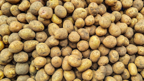 Full frame shot of potatoes for sale at market stall