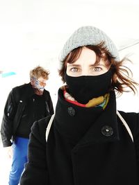 Portrait of a young woman in snow