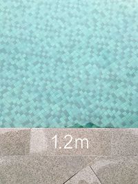 High angle view of number on poolside