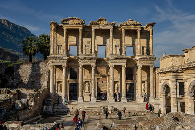 Group of people in front of historical building