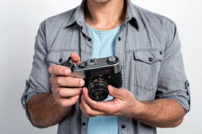 Midsection of man photographing