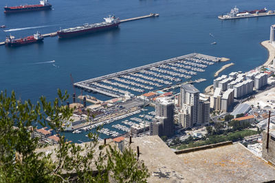 High angle view of city by sea