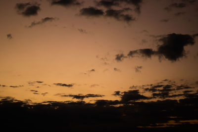Low angle view of dramatic sky during sunset