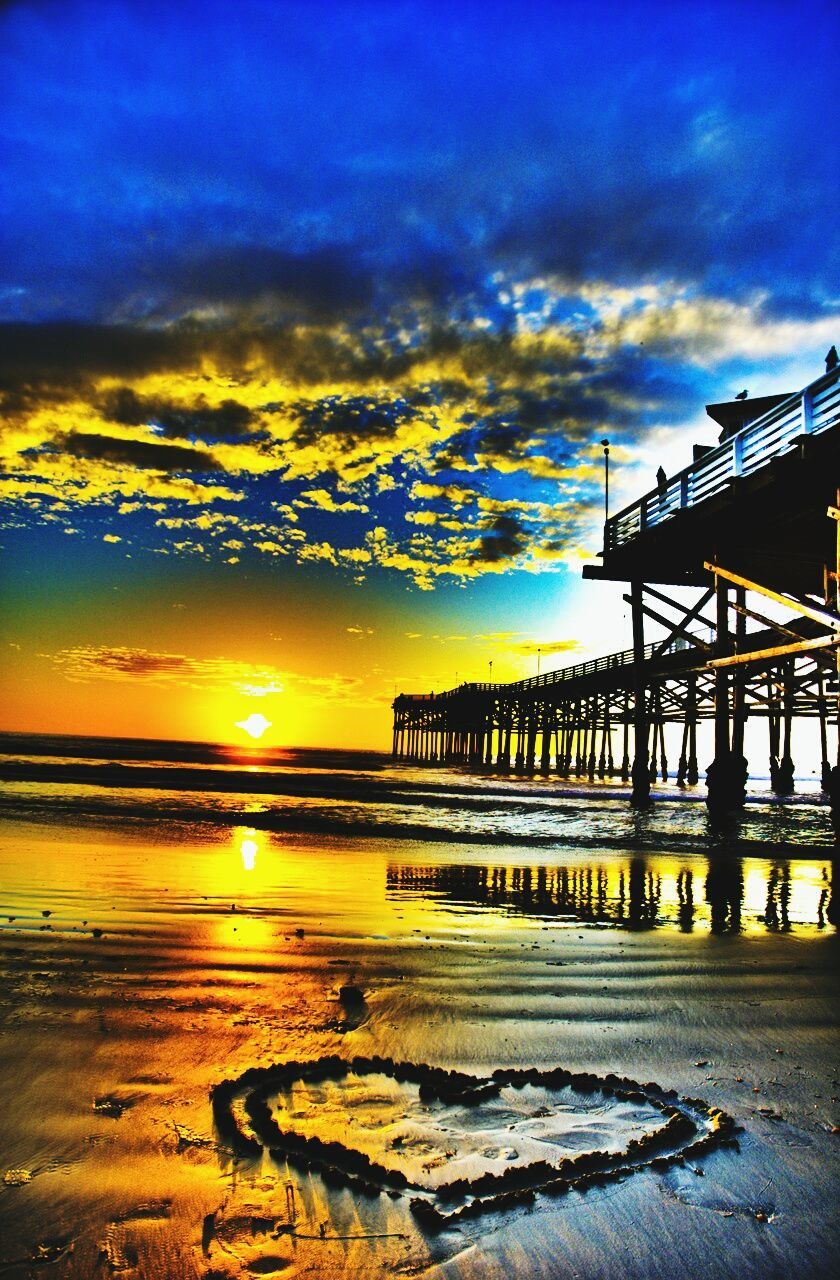 sunset, sky, water, cloud - sky, sea, horizon over water, orange color, built structure, scenics, beauty in nature, pier, beach, tranquility, nature, cloud, architecture, tranquil scene, reflection, shore, idyllic