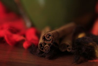 Close-up of red chili peppers on table