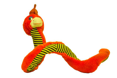 Close-up of red toy against white background