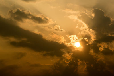 Low angle view of dramatic sky during sunset