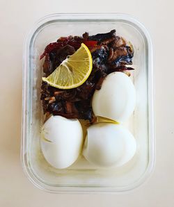 High angle view of fruits in container on table