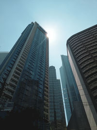 Low angle view of modern buildings against clear sky