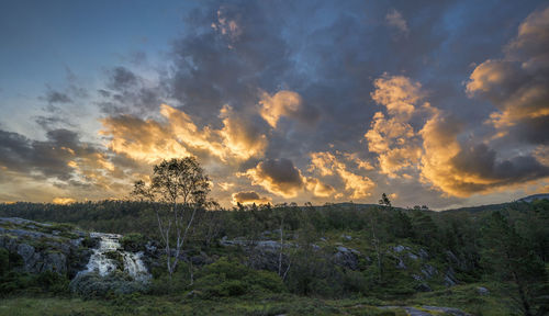 Scenic view of dramatic sky during sunset