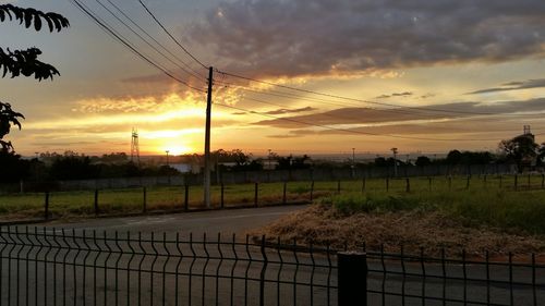 Scenic view of landscape against cloudy sky