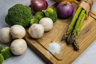 High angle view of vegetables on cutting board