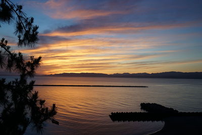 View of calm sea at sunset