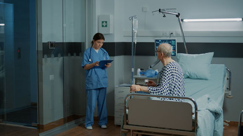 Doctor examining patient at hospital