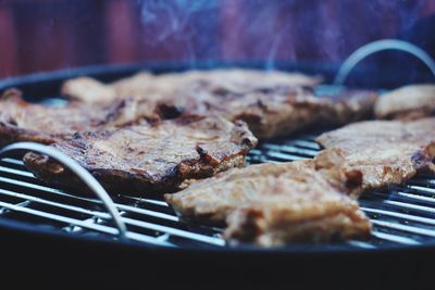 Close-up of meat on barbecue grill