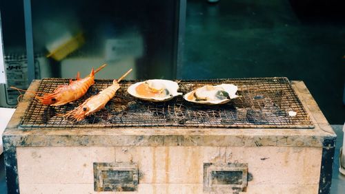 Prawns and oyster on barbeque grill