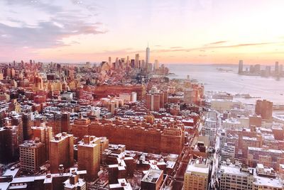High angle view of city at sunset