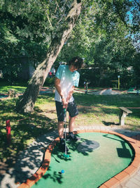 Full length of woman walking on field