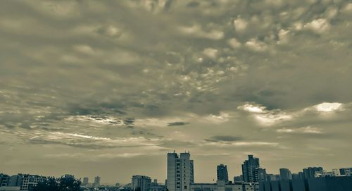 High section of cityscape against sky