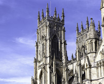 Low angle view of york minster against sky